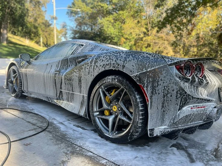 Foam wash on a sports car exterior